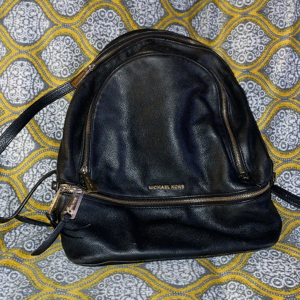 Black leather Micheal Kors backpack